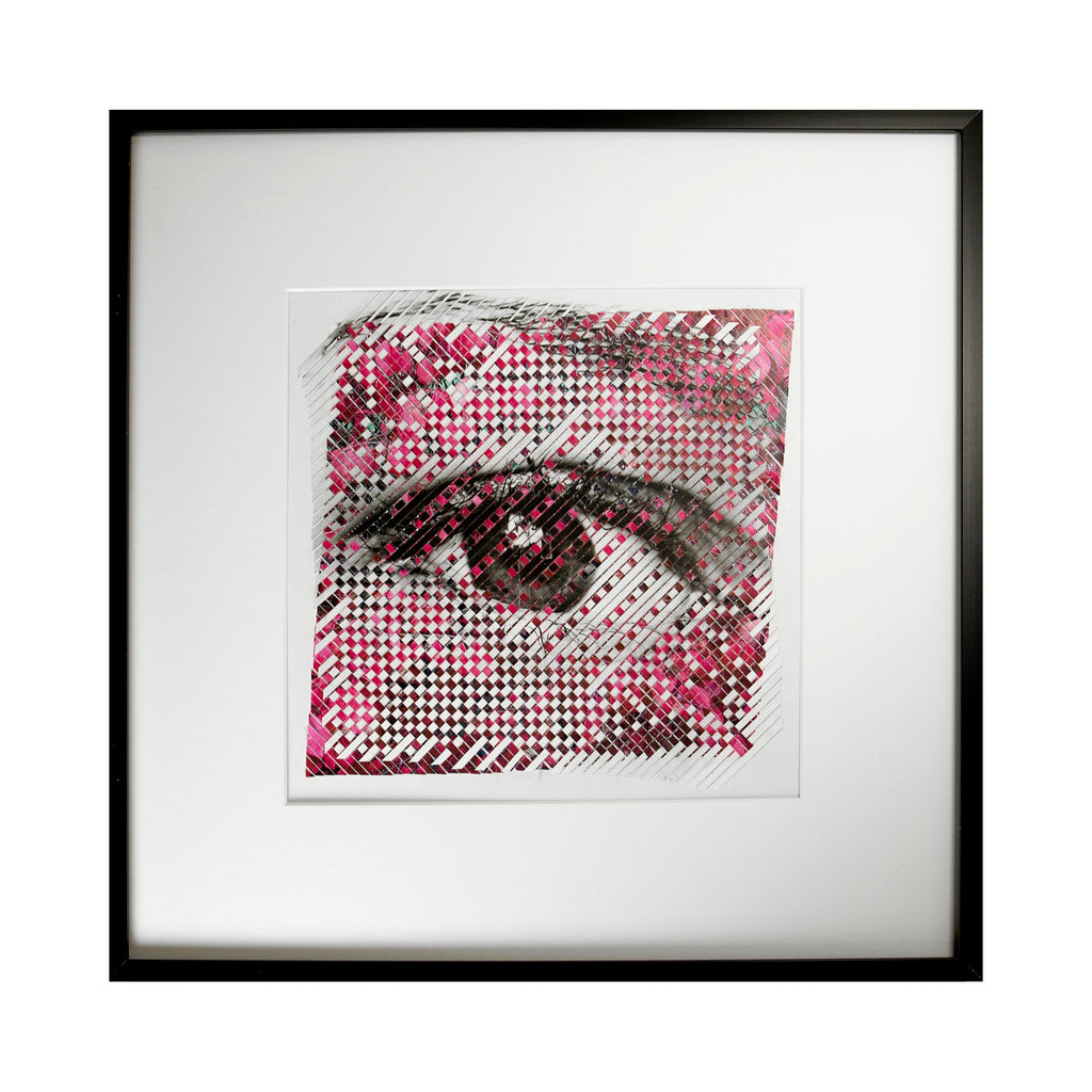 The artwork 'Pixelated' by Kiana Honarmand features an abstract eye rendered in a striking pixelated pattern, combining pink, black, and white tones. The digital prints are hand-cut and woven to create a mosaic-like texture, displaying intricate geometric patterns that blend traditional weaving techniques with modern digital aesthetics, framed in a minimal black frame on white matting.