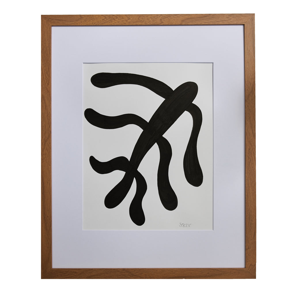 The artwork 'Morning Meditation III' by Shadia Sabagh features a bold abstract black brushstroke on white paper, reminiscent of minimalist Asian calligraphy. The organic, flowing form suggests a graceful plant tendril or dancing figure, executed in acrylic marker with confident, fluid strokes, presented in a classic wooden frame.