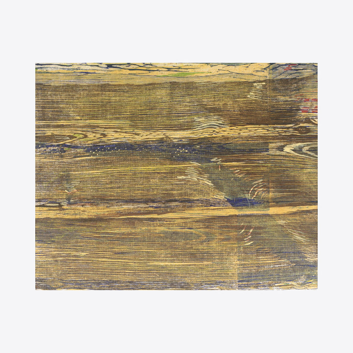 The artwork 'Floating Core' by Emna Zghal features abstract horizontal layers of woodcut prints in earthy gold and deep charcoal tones. The textured composition reveals natural wood grain patterns and organic striations, creating a contemplative landscape-like effect mounted on canvas. The 16x20 inch piece demonstrates masterful woodblock printing technique with subtle color variations and rustic textures.