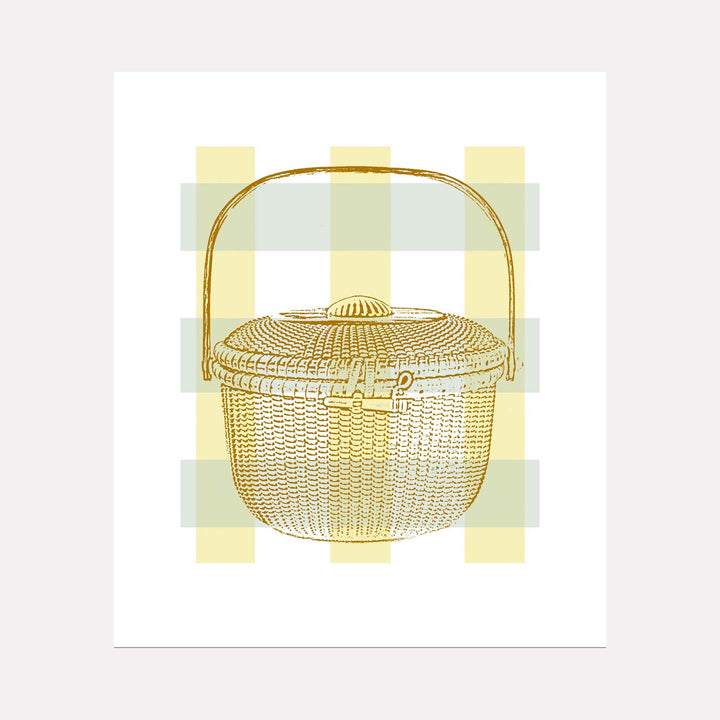 The artwork 'Lightship Series 1 - Patsy's Basket' by Lauder Bowden features a detailed illustration of a traditional Nantucket basket in golden hues against a soft yellow and mint checkered background. The woven rattan basket displays intricate weaving patterns, a domed lid, and an arched handle, rendered in a minimalist, elegant style as a giclee print on archival paper.