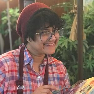 Brooklyn local artist Rita BasuMallick headshot and art studio