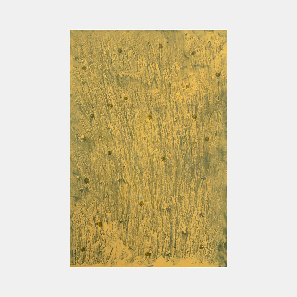 The artwork 'Biophilia 34' by George Stanojevic features vertical streaks of golden ochre pigment with scattered dark green dots throughout the canvas, creating an organic pattern reminiscent of tall grass or wheat fields. Natural elements and sunlight influence create subtle textural variations across the abstract composition. Created using pigment and mixed media on canvas by George Stanojevic.