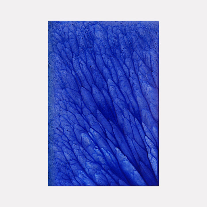 The artwork 'Biophilia 40' by George Stanojevic features vibrant cobalt blue organic patterns resembling flowing water or tree branches, created through natural elements on canvas. Deep textural ridges and valleys form a dynamic abstract composition with varying shades of ultramarine, creating a mesmerizing ripple effect across the surface.