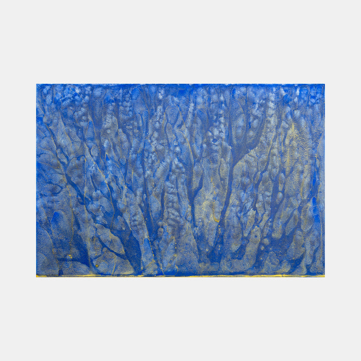 The artwork 'Biophilia 8' by George Stanojevic features organic branching patterns resembling river deltas or tree branches in vibrant cobalt blue and silver. The abstract composition shows textural elements created by natural elements, with flowing watercolor-like effects and metallic accents across the canvas surface, embodying a harmonious blend of controlled artistry and natural processes.