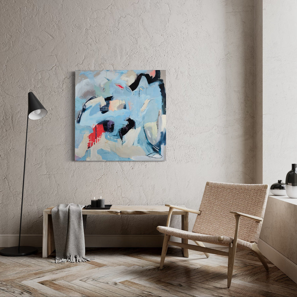 The artwork 'Drift' by Gail Winbury features dynamic abstract expressionism with bold brushstrokes in light blue, black, and coral red. The composition shows fluid movement across a white background, with gestural marks in oil paint complemented by subtle graphite and charcoal details on linen canvas, creating a sense of ethereal motion and depth.