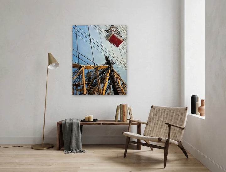 The artwork, 59th Street Bridge With Red Tram, by Allan Gorman, displayed in a room.