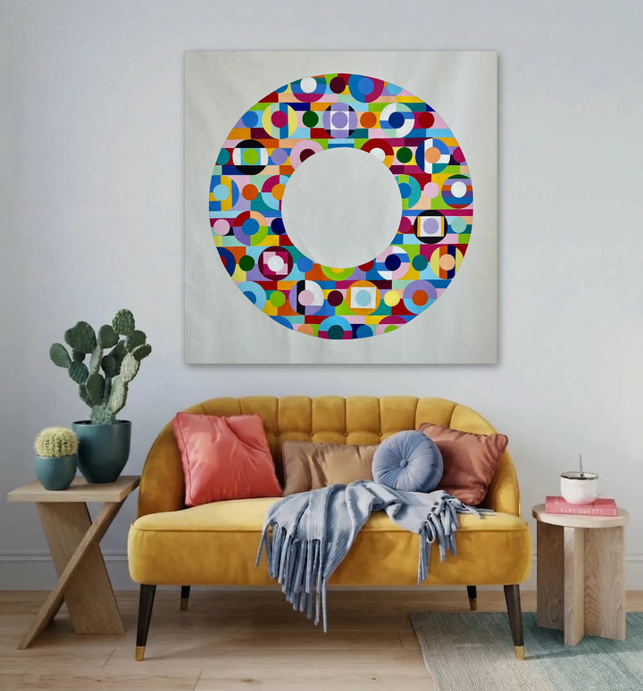 The artwork, Color Wheel, by Benna Holden, displayed in a room.