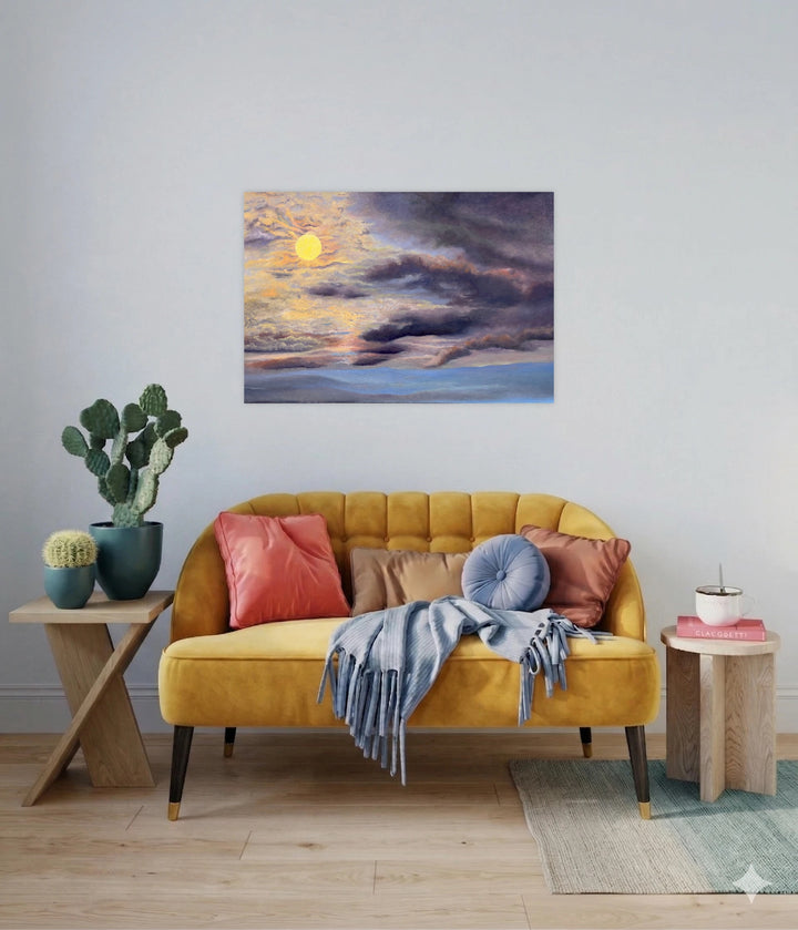 Breakthrough by Nadia Parsons depicts a glowing sun emerging through layers of dynamic clouds in gold, gray, and soft blue hues, capturing an evocative moment of light and change in distinctive atmospheric art.