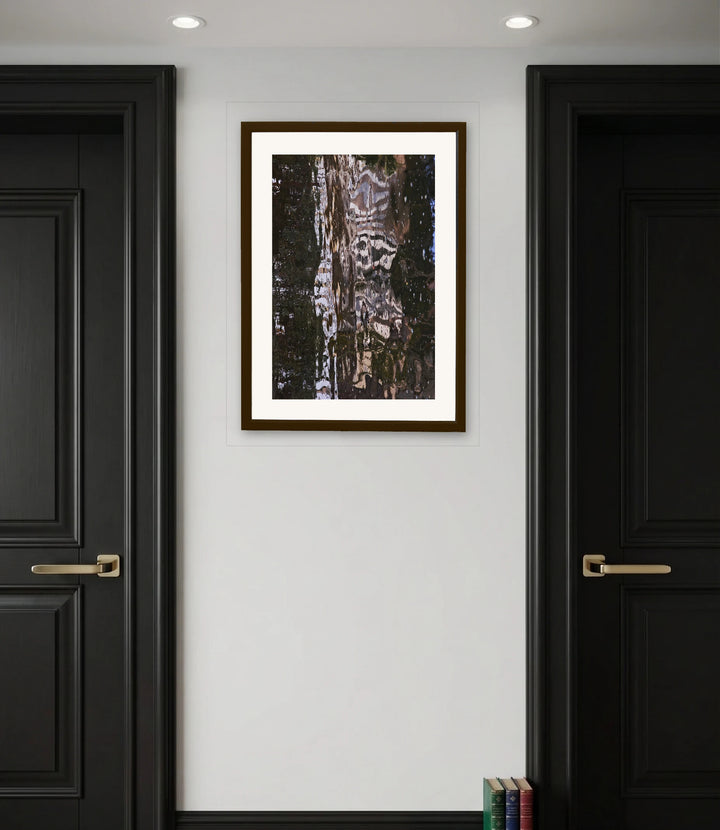 The artwork, Diving Zebra, by Dolores Lusitana, displayed in a room.