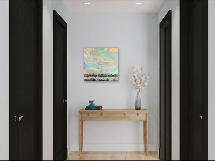 The artwork, Embrace, by Tammy Kushnir, displayed in a room.