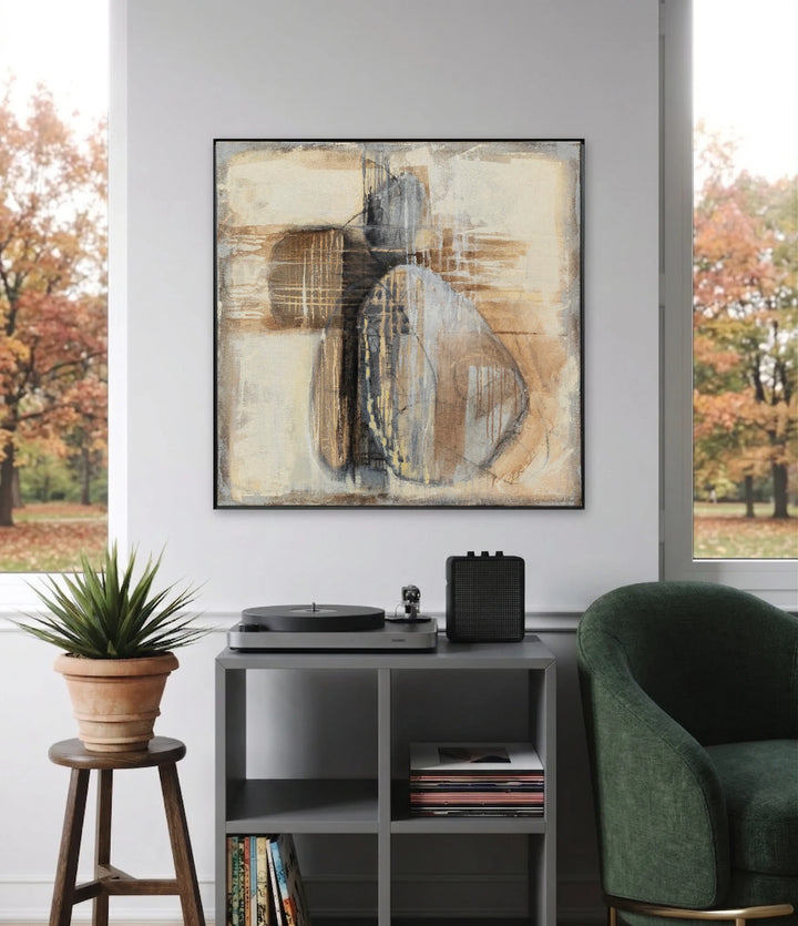 The artwork, Earthen Forms and Rhythyms, by Ann Flemings, displayed in a room.