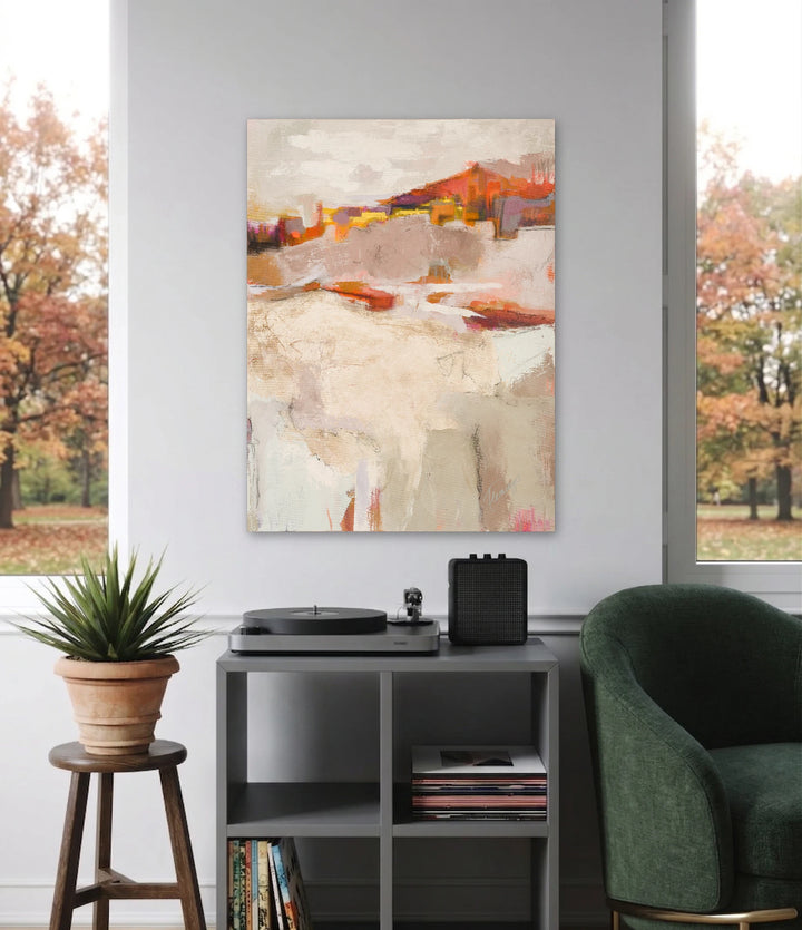 The artwork, Embers Beneath Soft Horizons, by Ann Flemings, displayed in a room.