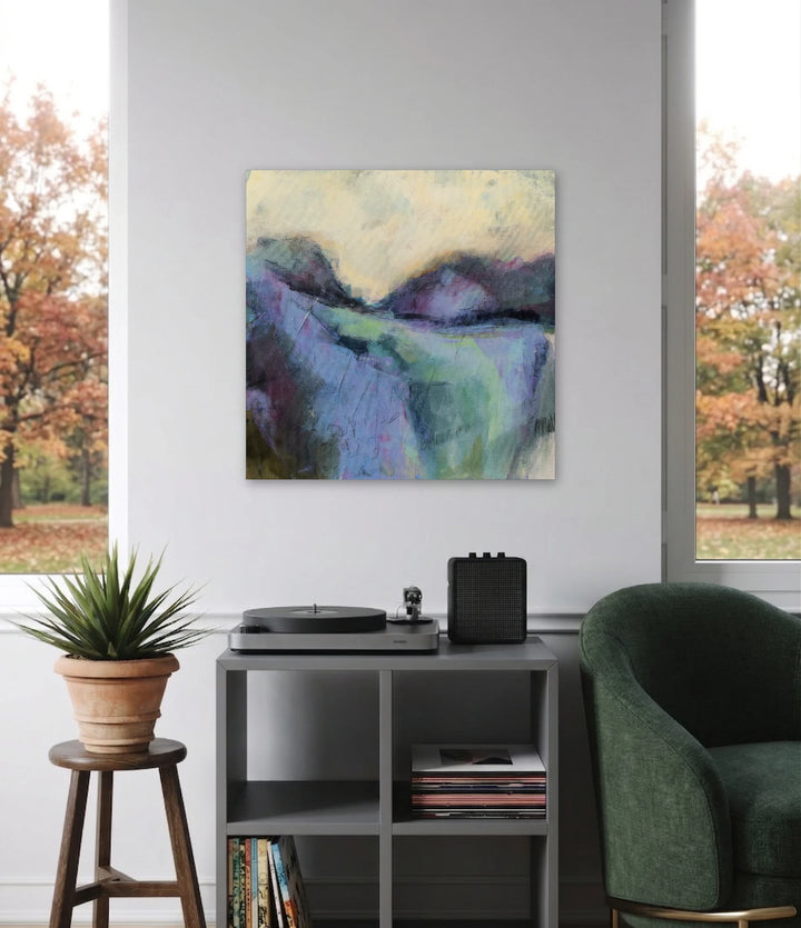 The artwork, Moody Misty Mountains, by Ann Flemings, displayed in a room.