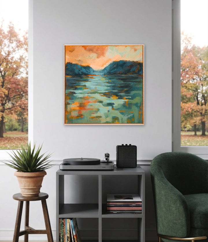The artwork, Sapphire Depths and Embered Skies, by Ann Flemings, displayed in a room.
