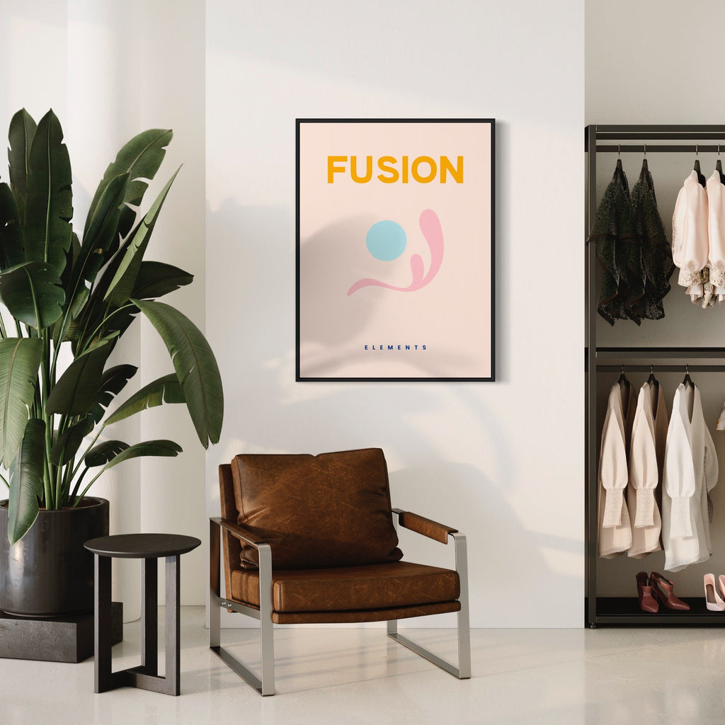 The artwork 'Fusion Poster' by Alina Glotova features a minimalist design with bold yellow text against a soft beige background. Abstract elements include a light blue circle and pink curved shape, creating a harmonious composition. The 30x40 inch print is displayed in a sleek black frame against a white wall, perfect for modern interior spaces.