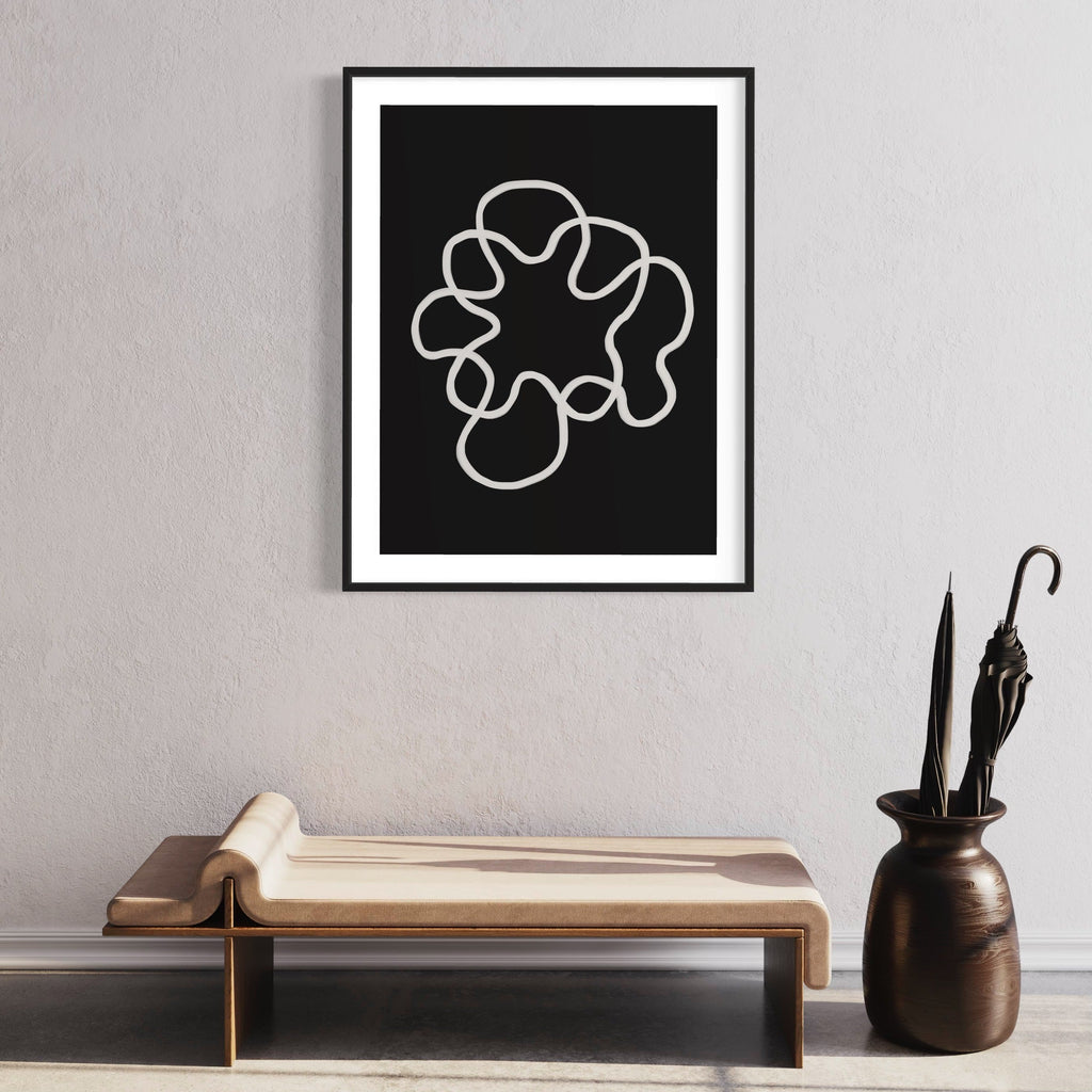 The artwork 'Infinity Wave Linear' by Alina Glotova features a minimalist continuous white line forming an abstract circular pattern against a deep black background. The elegant curved design resembles a flowing wave or flower shape, creating a sense of perpetual motion and harmony in a modern print format.