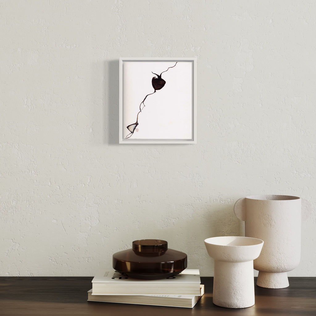 The artwork 'Plumb' by Susan Rowe Harrison features a minimalist ink drawing on white paper, displaying a simple yet striking black plumb bob suspended by a jagged line. The composition, set in a white frame, captures the essence of gravitational pull through clean, precise linework on crisp paper. Created with ink on paper, measuring 9.5 x 10.75 inches by Susan Rowe Harrison.
