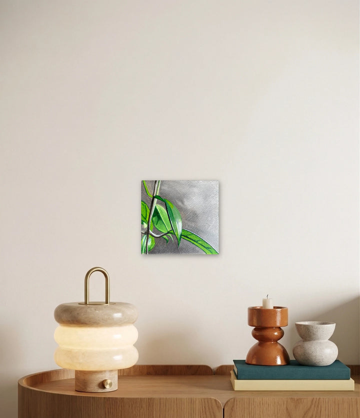 The artwork, Prefers Medium to Bright Indirect Light., by Jessica Preble, displayed in a room.