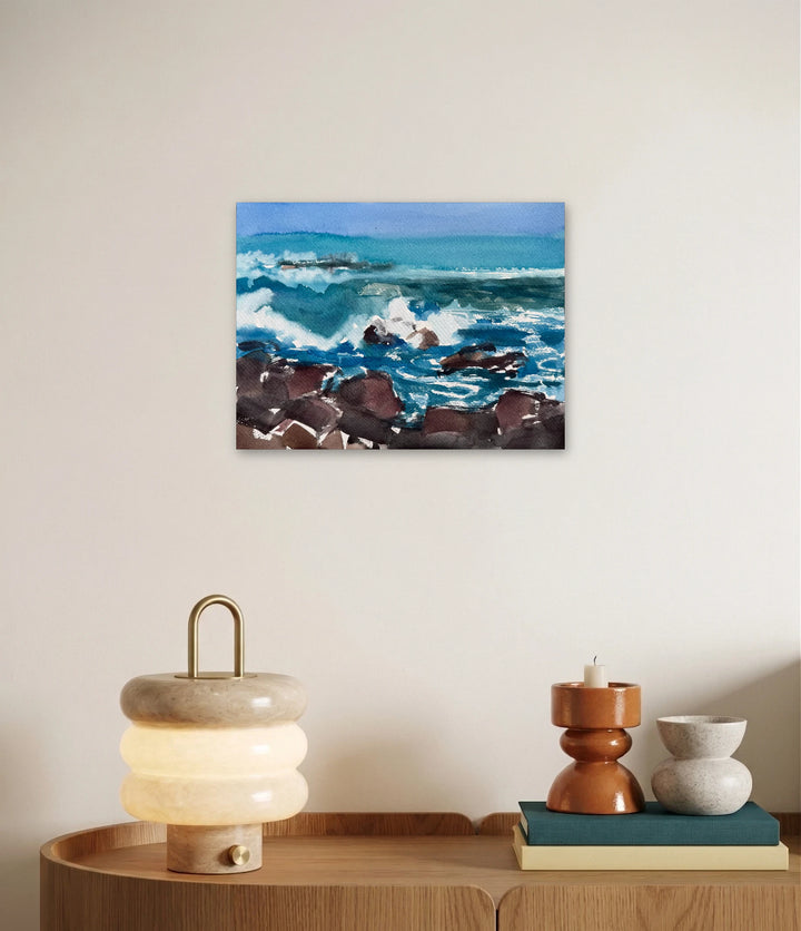 The artwork, Rocky Shore, by Melanie Kozol, displayed in a room.