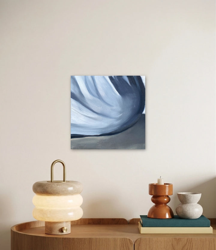 The artwork, Study of a Sheet - Sunday, by Jessica Preble, displayed in a room.