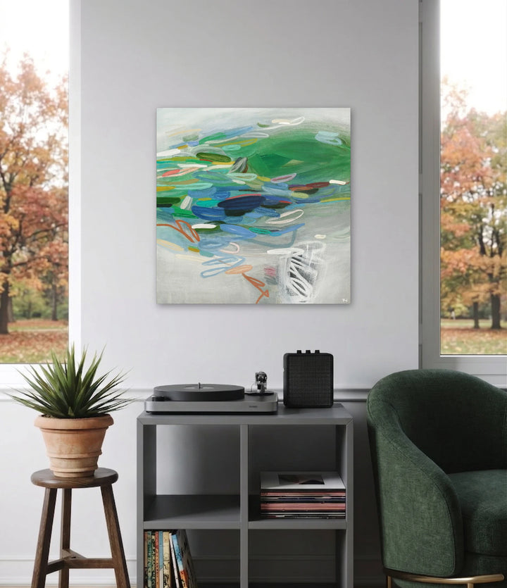 The artwork, Fresh Greens 2, by Terri Dilling, displayed in a room.