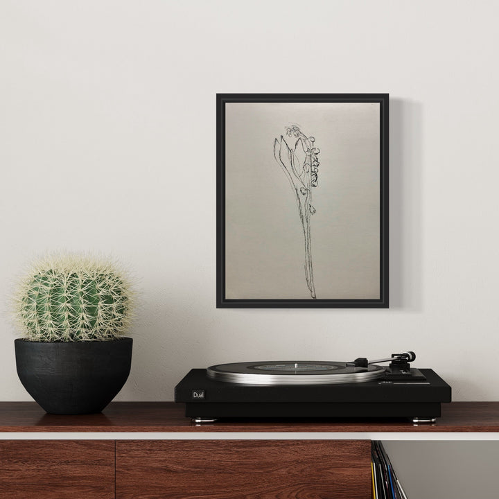 The artwork 'muguet from life, VIII' by Ryan Zogheb features a delicate charcoal drawing of a single lily of the valley stem, rendered with minimalist strokes against a light background. The black frame enhances the stark beauty of the botanical sketch, showing fine details of the flower's bell-shaped blooms and graceful stem in monochromatic tones. By Ryan Zogheb.
