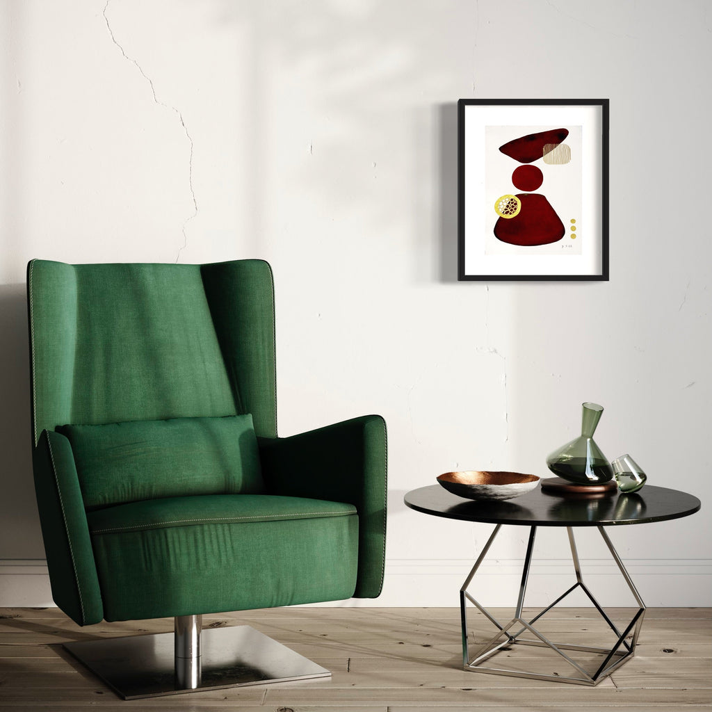 The artwork 'Majestic Balance' by Jocelyn Benford features abstract geometric shapes in deep burgundy and cream tones arranged in a harmonious stack, suggesting equilibrium and poise. The watercolor and mixed media composition creates subtle textures against the white background, framed in classic black, presenting a modern minimalist aesthetic in 20x16 inches format. By Jocelyn Benford.