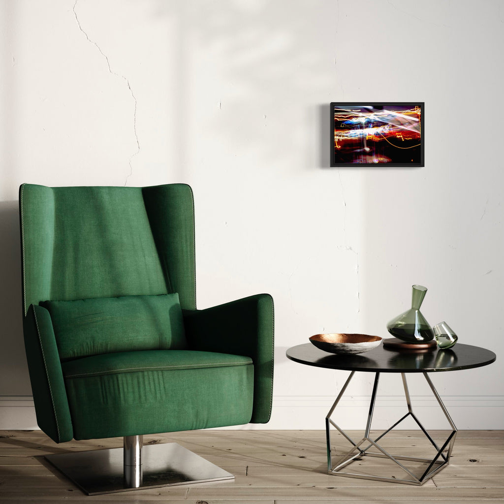 The artwork 'Particle Physics 34' by Chunbum Park features dynamic light trails creating abstract patterns against a dark background. Vibrant streaks of red, white, blue, and golden light interweave across the composition, suggesting motion and energy. The long-exposure photography technique captures luminous paths resembling subatomic particle movements in a quantum field. Print dimensions 10x15 inches. By Chunbum Park.