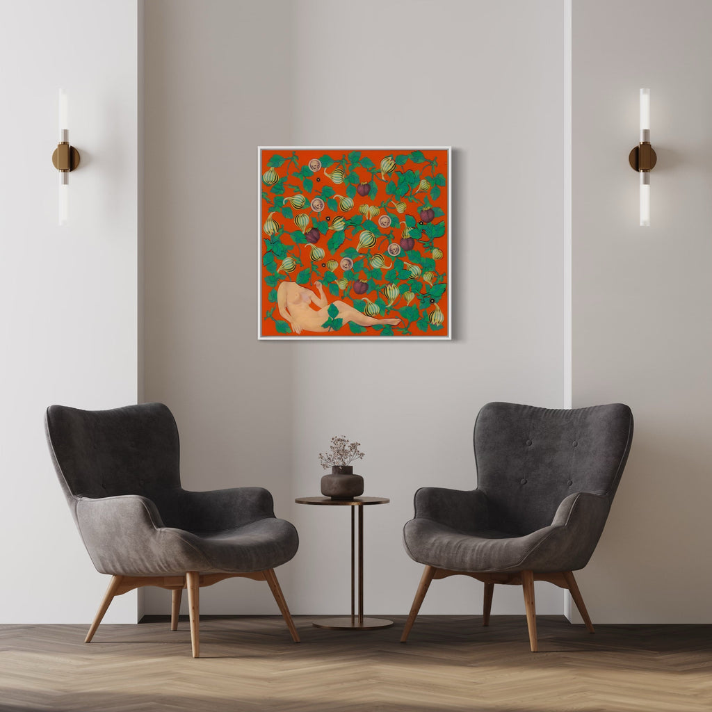 The artwork 'Garden' by Chelsea Amato features a vibrant orange and green color scheme with a repeating pattern of botanical elements, possibly leaves and flowers, scattered across the canvas. A stylized reclining figure in a neutral tone rests against the lush floral background, creating a harmonious mixed media collage that measures 30 by 30 inches. By Chelsea Amato.