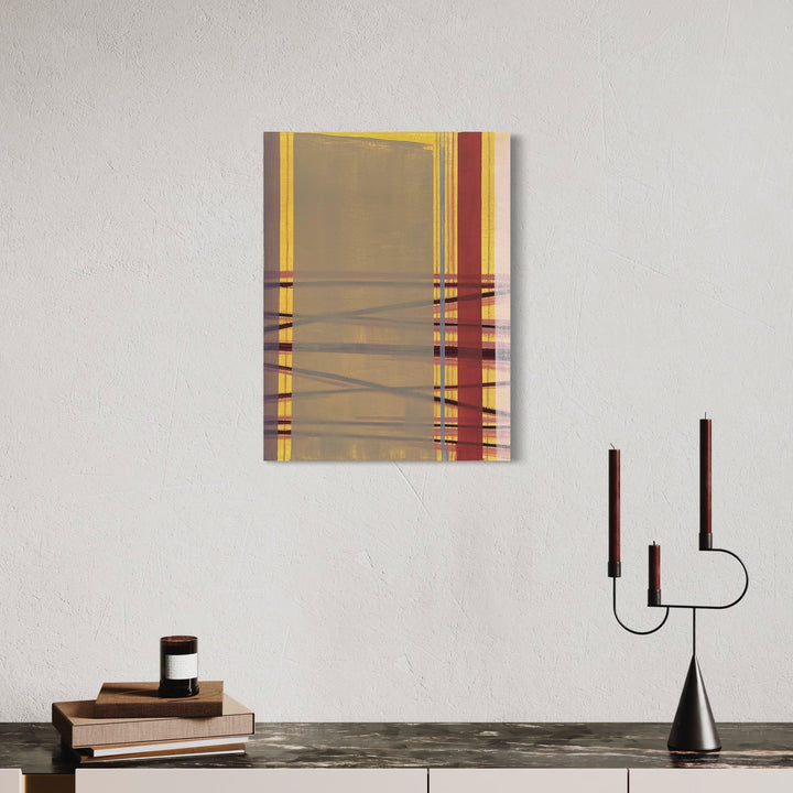 The artwork 'Interstices (bands)' by Cora Jane Glasser features intersecting geometric bands in warm yellow and deep red tones against a neutral taupe background. Oil and wax pencil create subtle textures on linen, with horizontal and vertical lines forming a minimalist grid-like composition on an 18x24 inch panel.