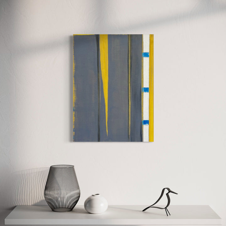 The artwork 'Interstices (blue notches)' features vertical geometric patterns with bold yellow stripes intersecting a muted gray-blue background, accented by bright blue marks along the right edge, painted in oil and wax-based pencil on linen. Contemporary minimalist abstract artwork by Cora Jane Glasser.