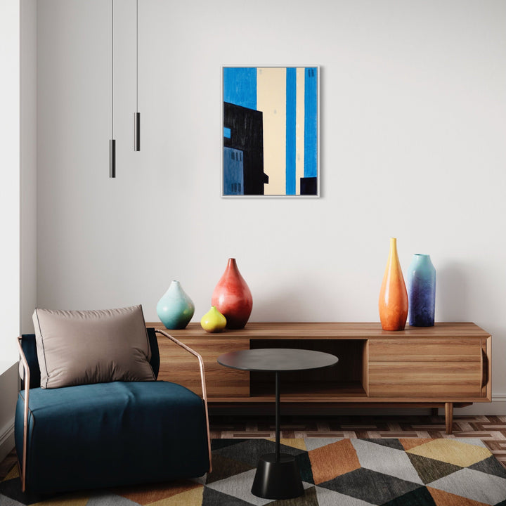 The artwork 'Sunrise in the West-11' by Cora Jane Glasser features bold geometric abstraction with vertical strips of vibrant blue and white, contrasting against a dark angular form. Created with oil and wax pastel on Arches oil paper, the composition demonstrates clean lines and stark architectural elements in a modernist style. 30x22 inches.