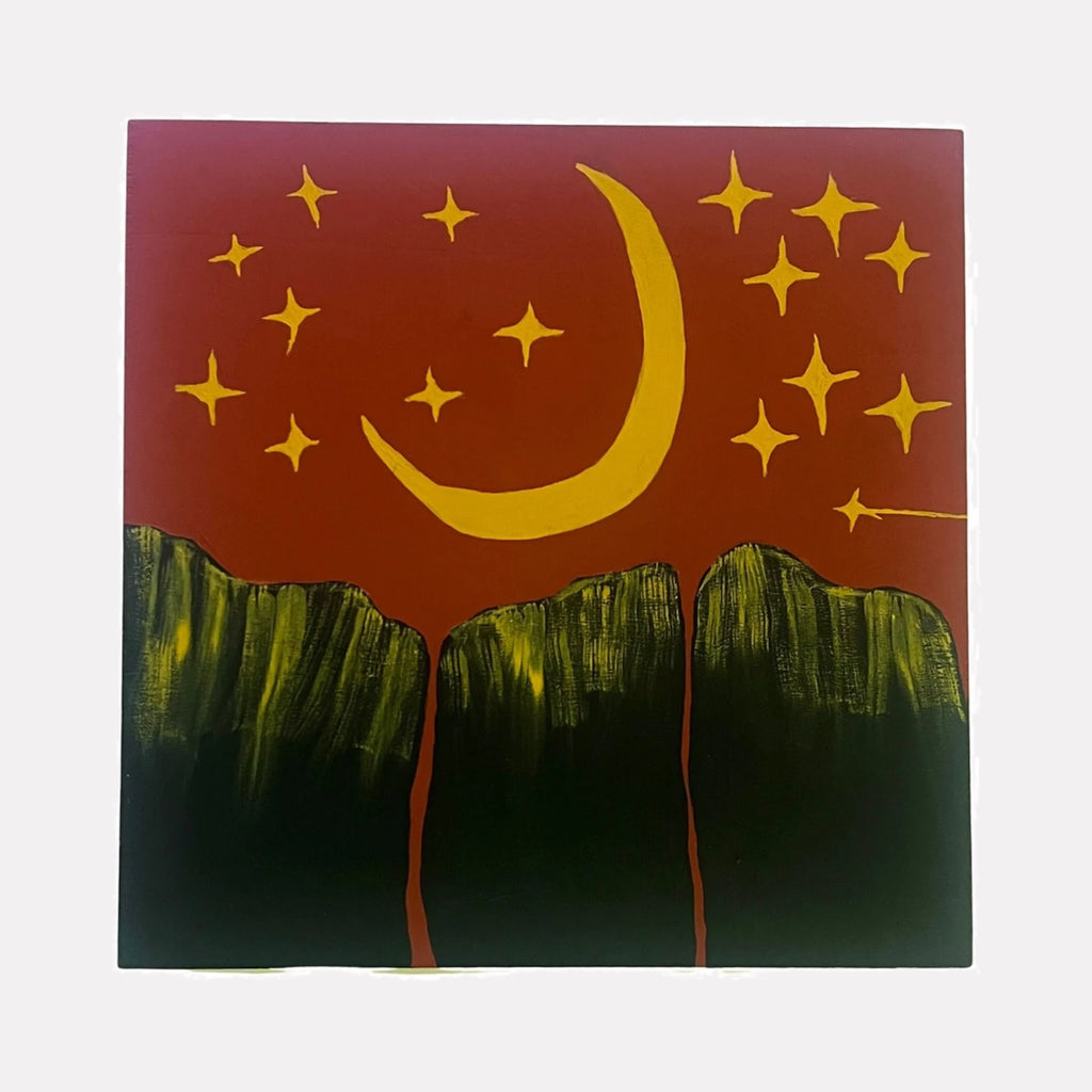 Buttes Under The Stars by Sunny Chapman is a Curina art piece depicting dark green buttes beneath a deep red sky, accented by a stylized golden crescent moon and scattered star shapes, creating a serene and abstract nighttime landscape with bold, contrasting colors.
