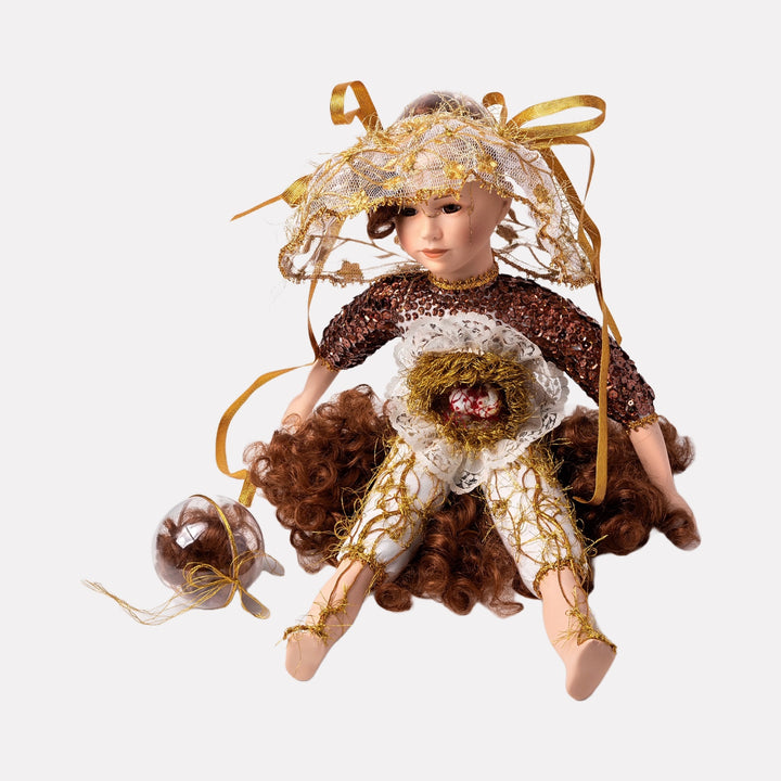The Suns Huntress and the Multiform Lilies by Lisyanet Rodriguez showcases a handcrafted doll with intricate fabric detailing, curly auburn hair, and golden accents, blending textured elements and delicate lace for a whimsical, artistic collectible piece by Curina.