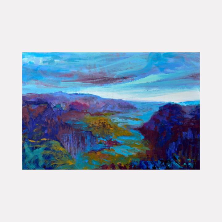 Waimea Canyon by Melanie Kozol is a Curina art piece depicting a vivid landscape with deep blues, purples, and greens that convey the canyon’s dramatic terrain beneath a swirling, dynamic sky. The painting blends expressive brushwork and rich colors to evoke natural grandeur.