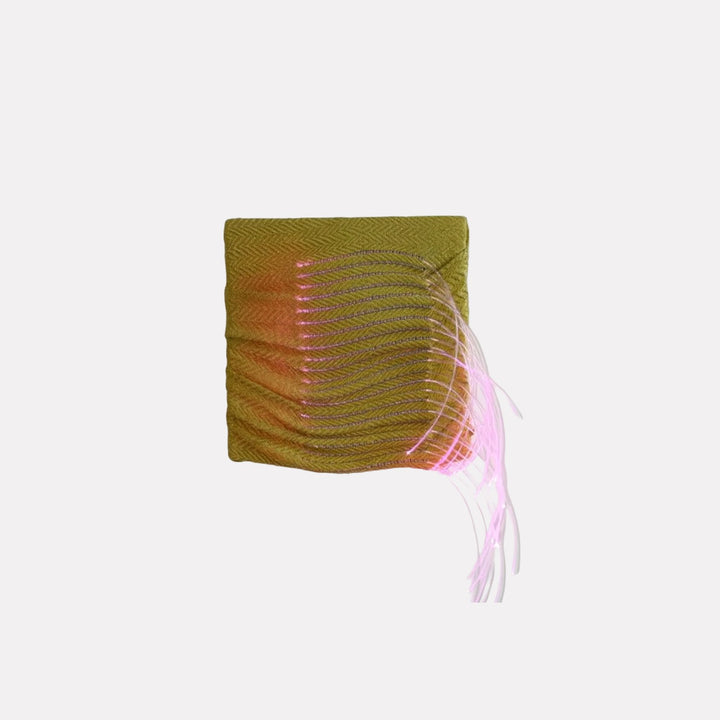 Ancient Futures (bug #3) by Craftwork features a square textile artwork blending olive green and subtle orange hues with flowing pink thread accents, creating a delicate interplay of texture and movement in a contemporary artistic expression.