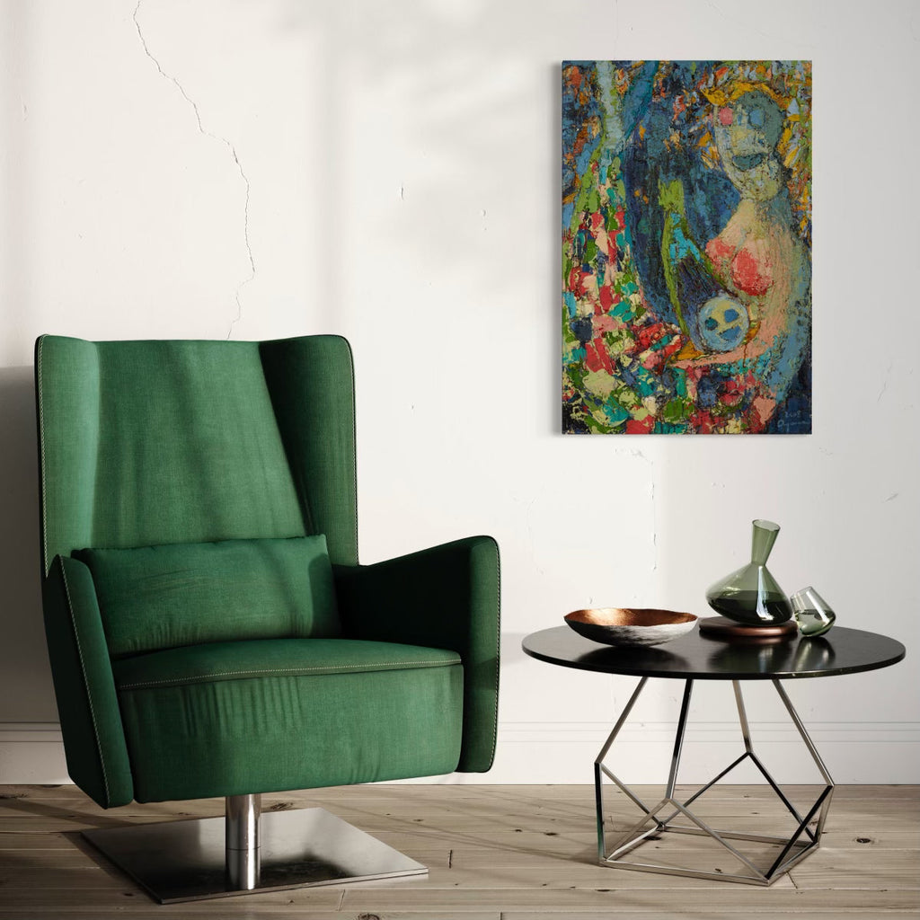 The artwork 'With Yemanja' features a vibrant abstract composition with swirling blues, greens, and coral hues. The oil painting showcases textural brushstrokes creating a mystical underwater atmosphere with flowing organic forms and floral elements against a dynamic background. Displayed above a modern side table beside an emerald velvet armchair. By Ayane Kurai.