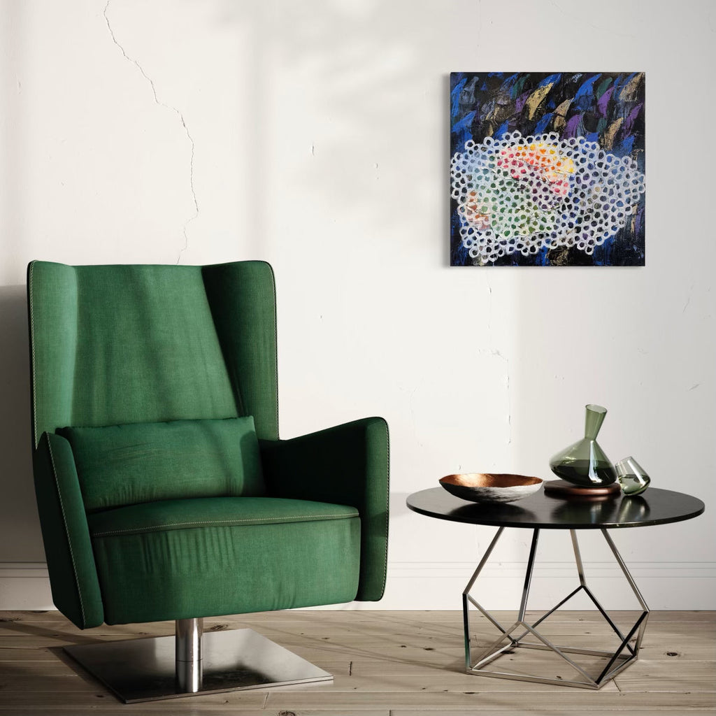 The artwork 'Hidden Thorns' by Ayane Kurai features a contemporary abstract composition with a honeycomb-like pattern in white dots against a dynamic background of deep blues and vibrant purples. Iridescent coral and peach hues peek through the geometric pattern, creating an organic flow across the 24x24 inch oil canvas, displayed above a modern green armchair. By Ayane Kurai.