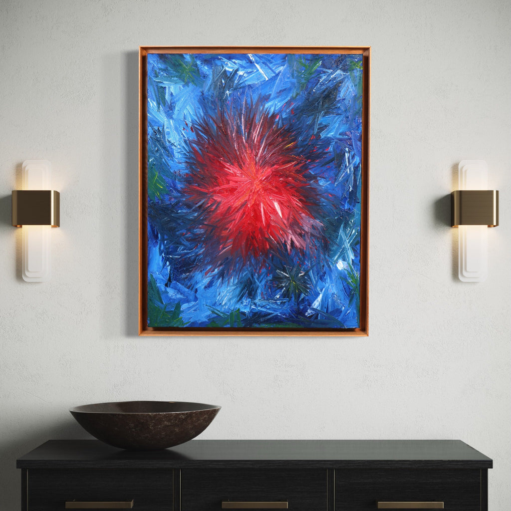 The artwork 'Rising 3' by Bill Burns features a vibrant abstract composition with an explosive red burst radiating from the center, surrounded by dynamic strokes of deep blue and touches of green. The oil painting creates a dramatic cosmic effect with textured brushwork and energetic movement, framed in warm wood on canvas, 30x24 inches.