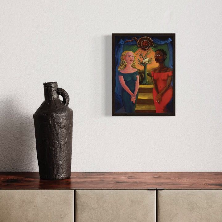 The artwork 'Sisters of Redemption' by JaeMe Bereal features two figures framing a central potted tree against a deep blue background. The composition shows contrasting warm and cool tones, with vibrant red and orange hues. A decorative arch frames the scene, while a symbolic emblem adorns the top. The high-quality lithograph on canvas captures the folk art style with bold, defined shapes.