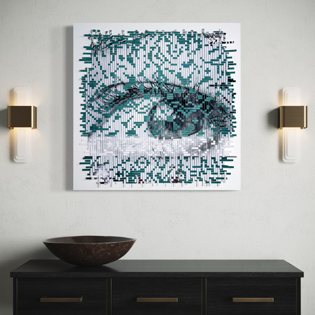 The artwork 'The Price of Choice' by Kiana Honarmand features a striking digital-style eye rendered in teal and black pixelated elements. The composition shows a detailed human eye emerging from a mosaic of geometric fragments, created through hand-cut and woven giclee prints on a white background, measuring 28x28 inches. By Kiana Honarmand.
