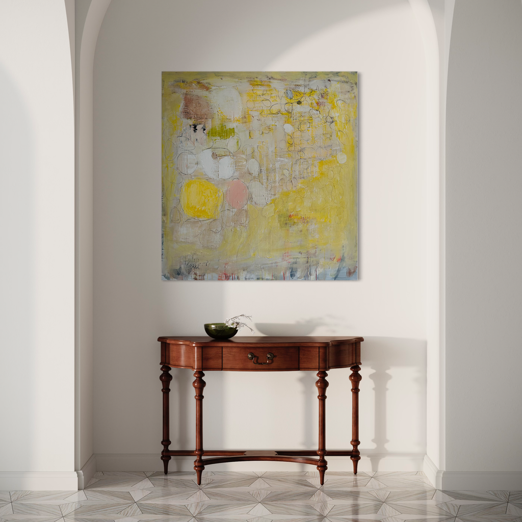 The artwork 'New York Swagger' by Petra Nimtz features an abstract expressionist composition on linen with vibrant yellow hues blending into soft whites and subtle pink undertones. The textured surface reveals gestural brushstrokes and layered paint, creating a dynamic urban-inspired aesthetic against the oil medium. Displayed above an elegant wooden console table.