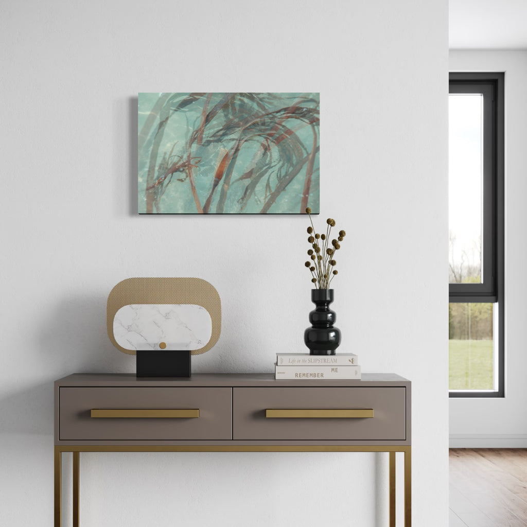 080A6734 by Eunice Pais features swirling organic forms in muted teal and rust tones, creating a dynamic yet soothing composition. Positioned above a modern console with gold accents, books, and a sculptural vase, the artwork infuses the minimalist space with a subtle, elegant energy and a touch of natural movement.