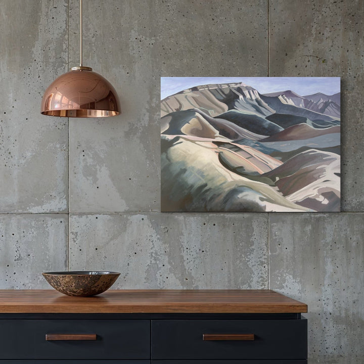 The artwork, A Long Climb, by Connie Falk, displayed in a room.