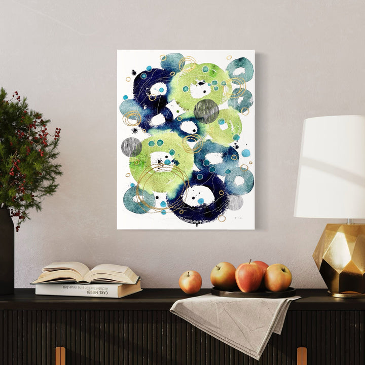A photo of the artwork Alluvium, by Jocelyn Benford, hanging on a wall.