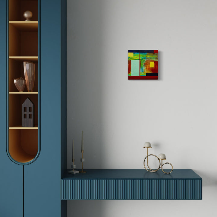 A photo of the artwork April Rain, by Vanessa Ryan, hanging on a wall.