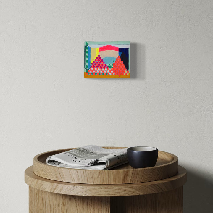 The artwork, Arcade, by Mark Brosseau, displayed in a room.
