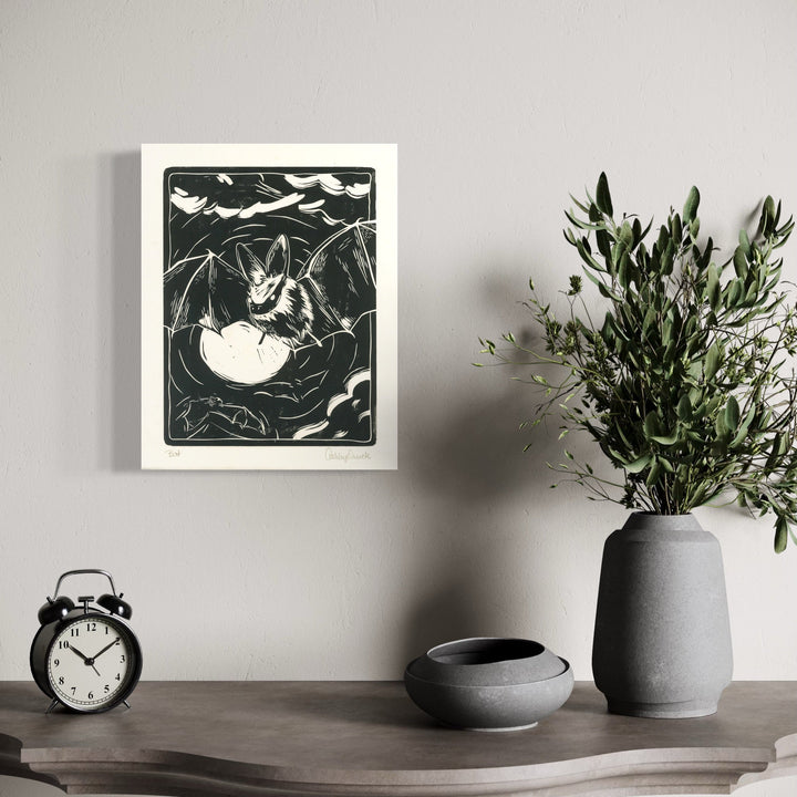 The artwork, Bat, by Ashley Ranae Quick, displayed in a room.