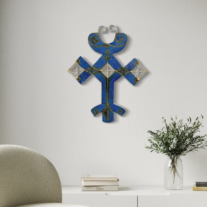 The artwork, Cannoli Wars, by Adina Andrus, displayed in a room.