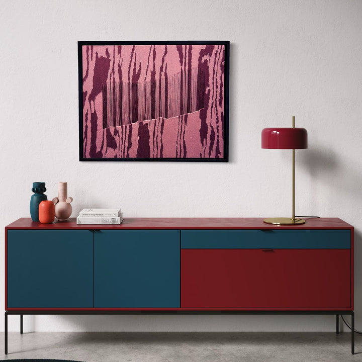 The artwork, Champagne Taste, by Quynn Douglas Dale, displayed in a room.